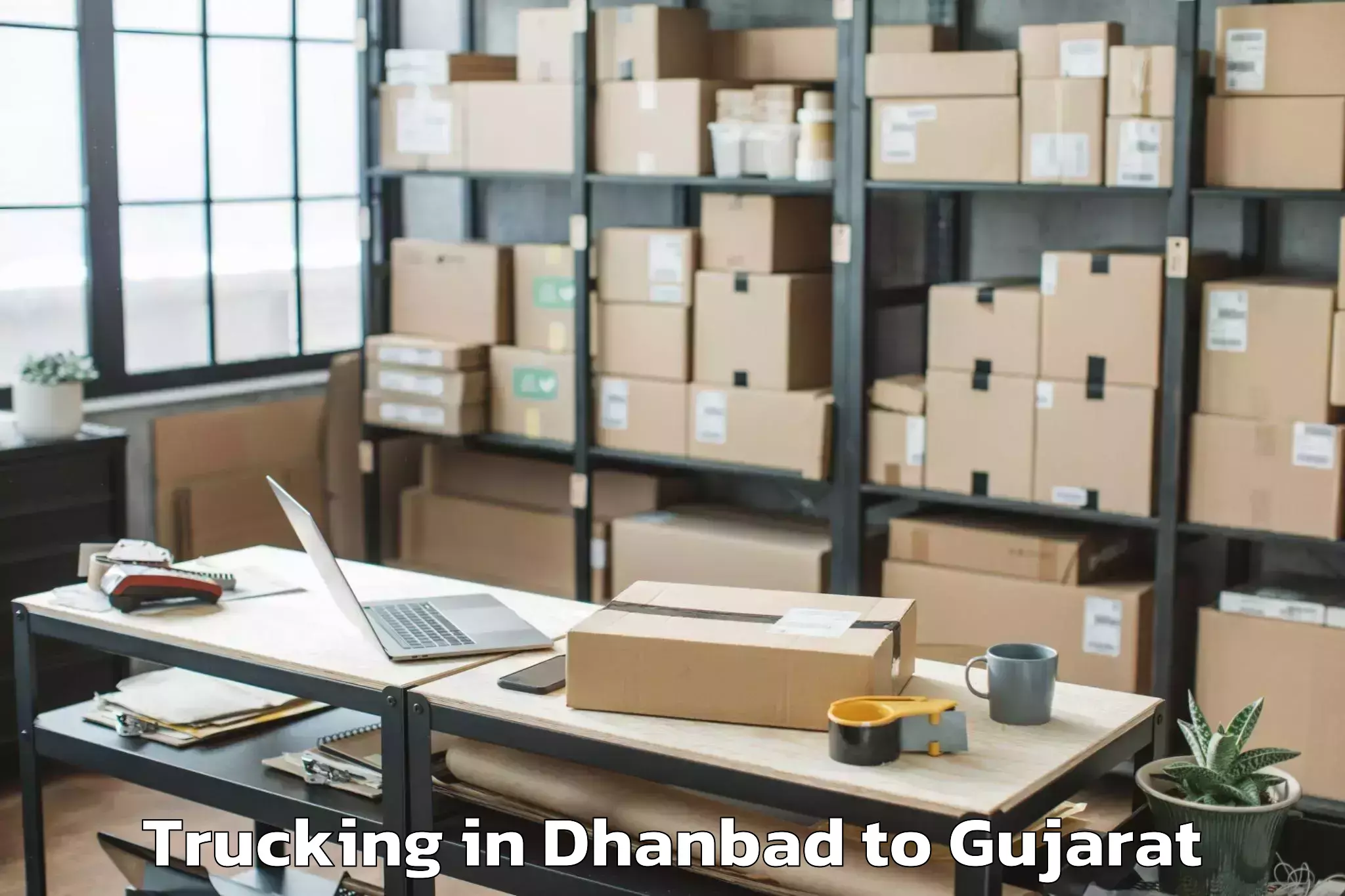 Book Dhanbad to Mahemdavad Trucking Online